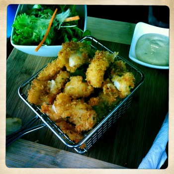 Lemon and Parmesan Herb Crumbed Calamari - Tender and tasty with good old fashioned homemade tartare and fresh lemon wedges (AU$9.50)