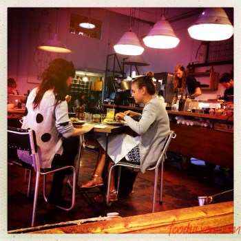 Manchester Press patrons enjoying their bagels