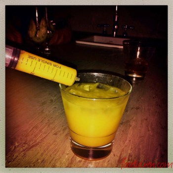 Tequila and Orange Juice with a syringe for good measure