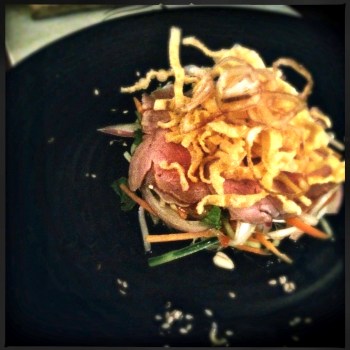 Entrée - Thai Beef Salad with Medium Roasted Veal Back Strap, Cucumber, Fresh Herbs, Nam Jim Dressing, Crispy Shallots and Fried Wonton Skins