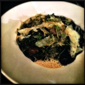 Main - Calamari Risotto with Squid Ink Arborio Rice, Sauteed Calamari, Garlic, Cherru, Tomato, Spinach, Red Onion, Pecorino, Lobster Foam and Micro Herbs 