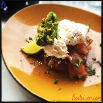 Corn and Jalapeno Fritters with Cured Salmon, Spiced Labne, Coconut Oil Dressing and a Runny Egg